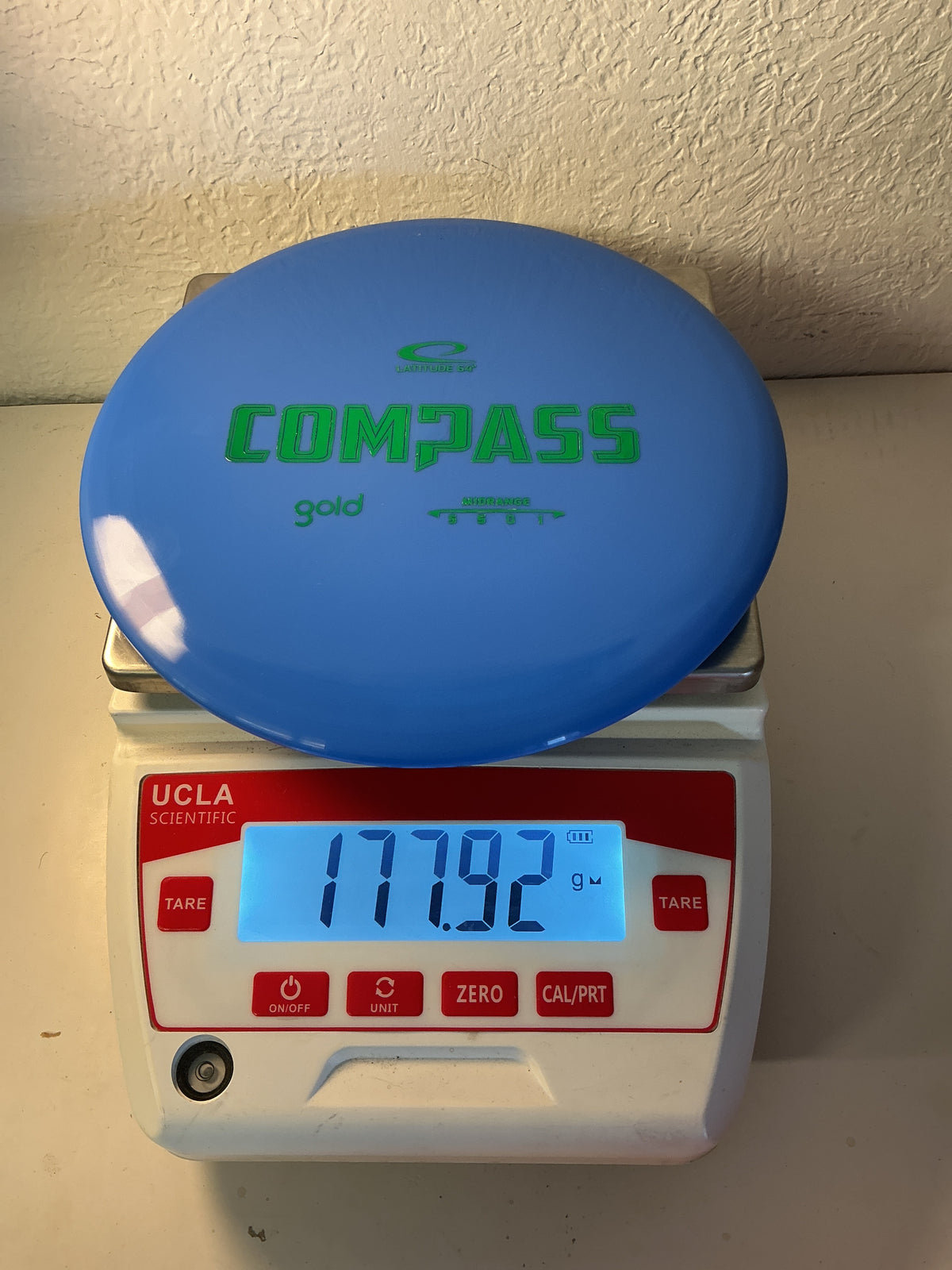 Latitude 64 Gold Compass