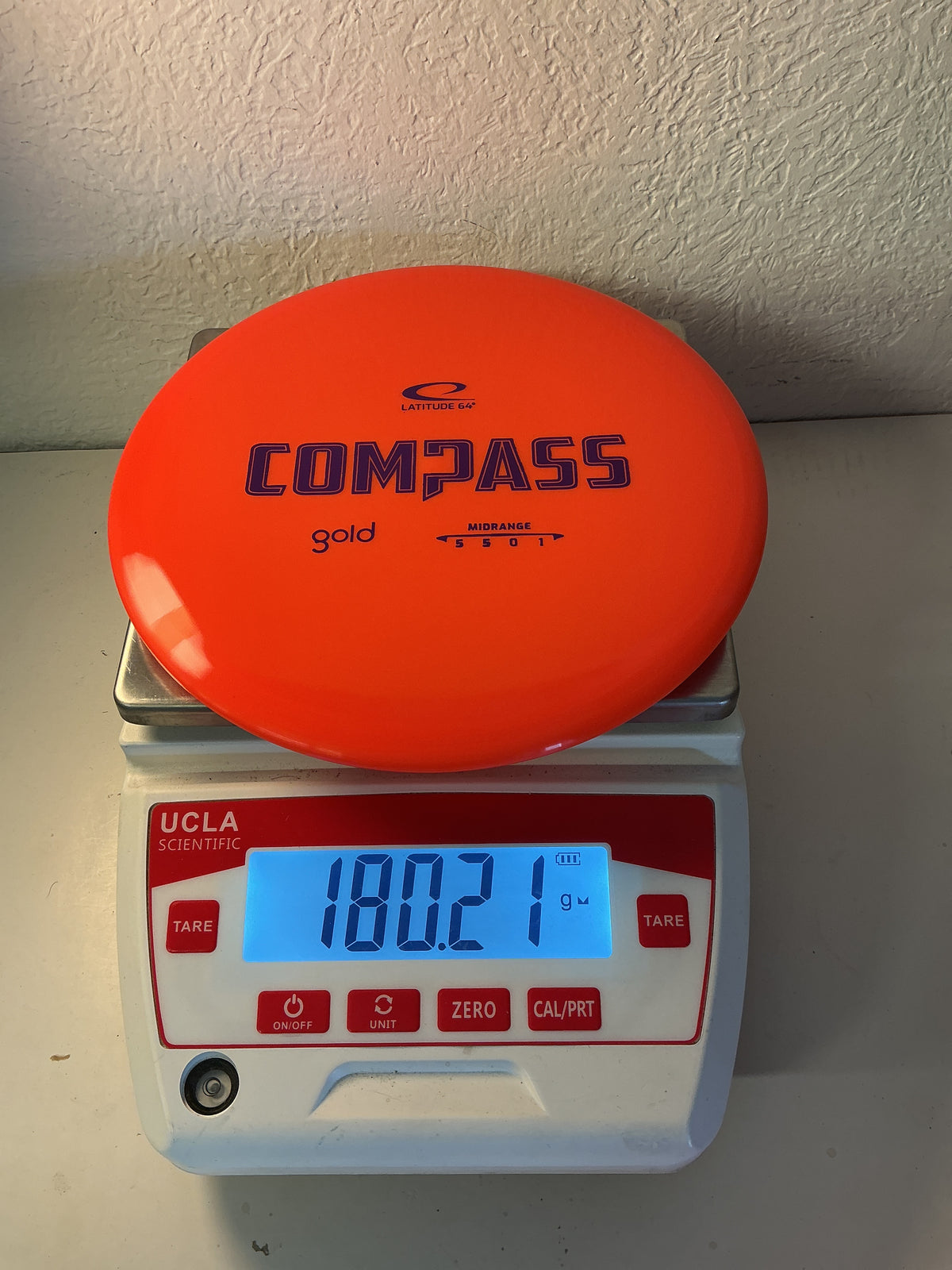 Latitude 64 Gold Compass
