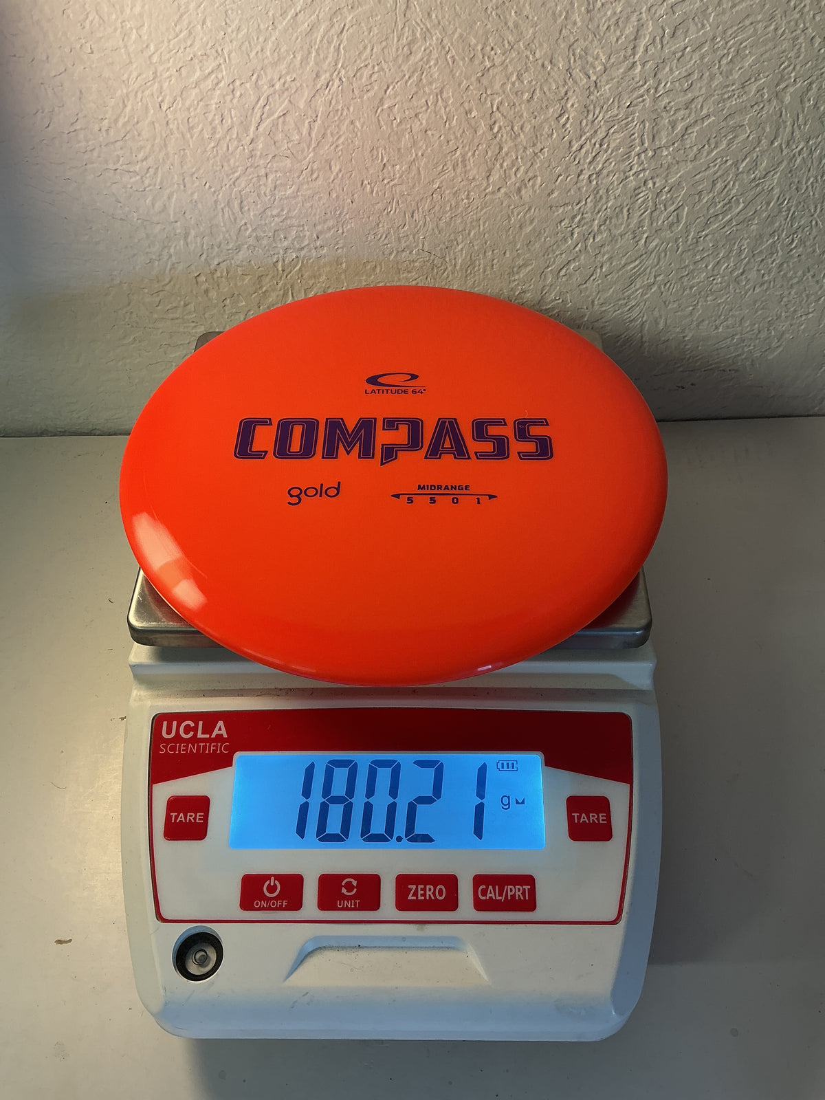 Latitude 64 Gold Compass